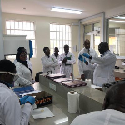 Demonstration on one of the techniques used for assessing the quality of male latex condoms by One of the staff members at DLS during the ISO 17025 audit.The audit is meant to assess the Laboratory compliance to the requirements of the ISO standard